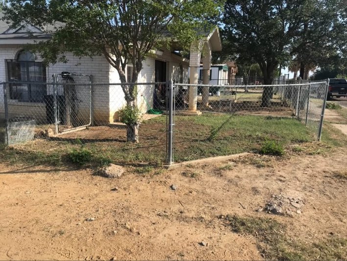 Before front yard cleanup by Del Valle Landscaping