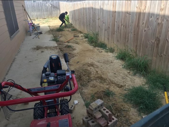 Before side yard soil preparation by Del Valle Landscaping